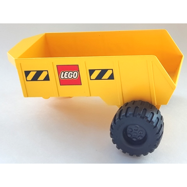 yellow duplo dump truck with 12 studs and hitch and lego logo pattern