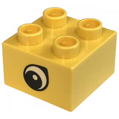 yellow duplo brick 2 x 2 with black and white teardrop eye pattern on opposite sides