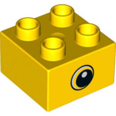 yellow duplo brick 2 x 2 with circled black eye small with crescent and white pupil pattern on both sides