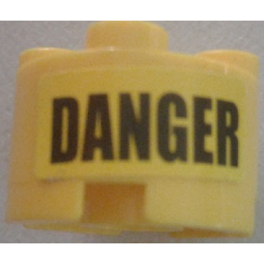yellow brick round 2 x 2 with axle hole with black danger pattern sticker - set 7787