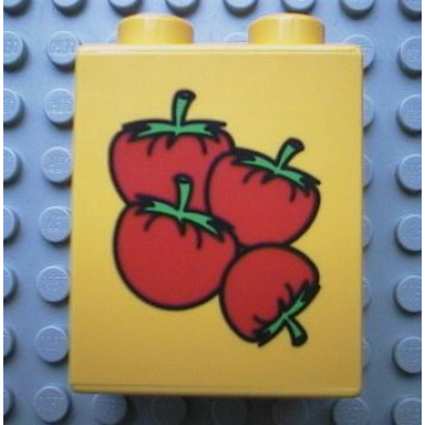 yellow duplo brick 1 x 2 x 2 with four tomatoes pattern