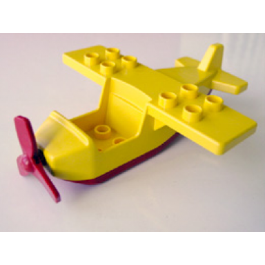 yellow duplo airplane small wings on top with red bottom and red propeller