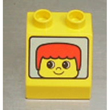 yellow duplo brick 2 x 2 x 1 1 2 slope 45 with boy head with red short hair pattern