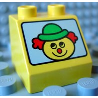 yellow duplo brick 2 x 2 x 1 1 2 slope 45 with clown head on white background pattern