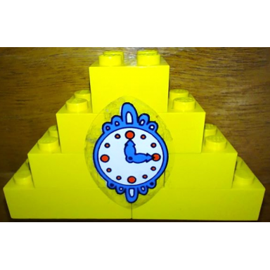 yellow stickered assembly 8 x 2 x 4 with blue clock with red dots and white face pattern sticker - sets 140-1 350-3 - 6 brick 2 x 2 without inside supports 2 brick 2 x 4 without cross supports