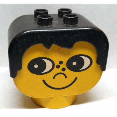 yellow duplo figure head human 2 x 2 base with fixed black hair with eyes looking right nose freckles and grin pattern