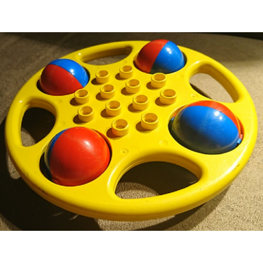 yellow duplo rattle circular with red blue wheels