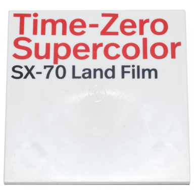 white tile 6 x 6 with red time-zero supercolor and black sx-70 land film pattern