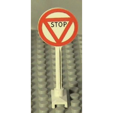white road sign round with stop in triangle pattern
