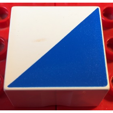 white duplo tile 2 x 2 x 1 with shape blue right triangle pattern