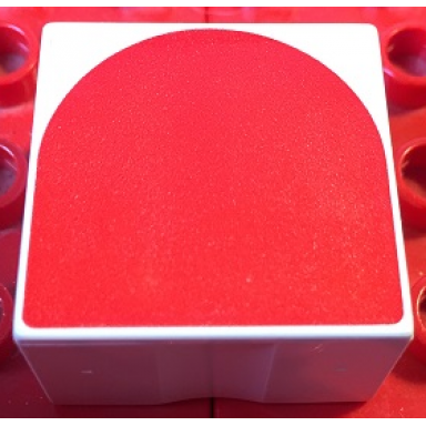 white duplo tile 2 x 2 x 1 with shape red inverse arch pattern