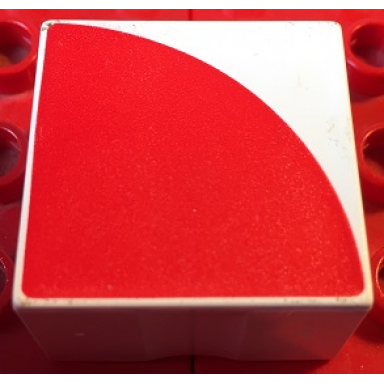 white duplo tile 2 x 2 x 1 with shape red quarter circle pattern