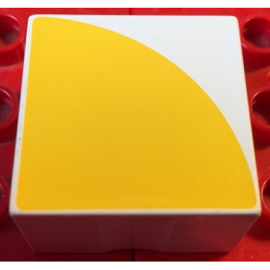 white duplo tile 2 x 2 x 1 with shape yellow quarter circle pattern
