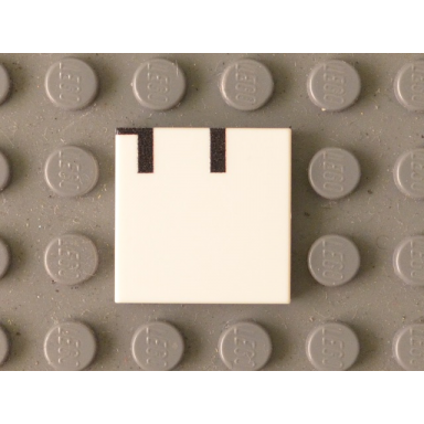 white tile 2 x 2 with black ht upper half pattern