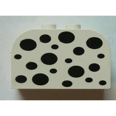 white slope curved 4 x 2 x 2 double with 4 studs with black spots pattern