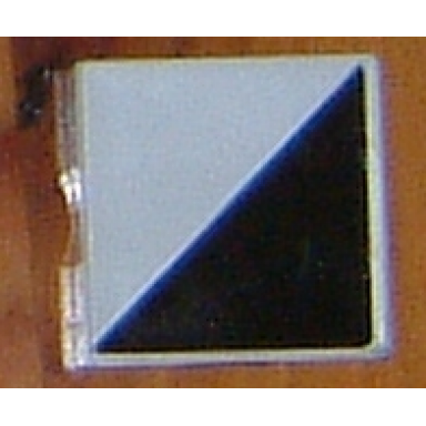 white duplo tile 2 x 2 with shape black right triangle pattern