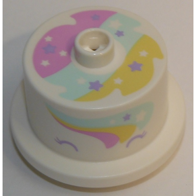 duplo cake with rainbow frosting and stars on top and side pattern