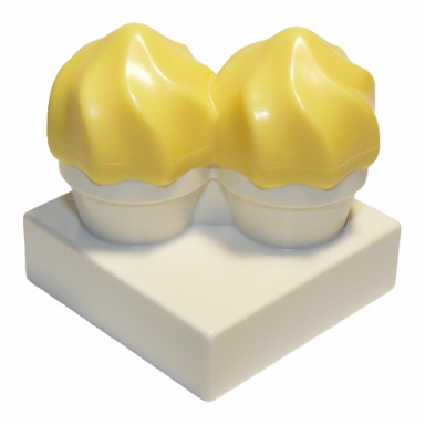 white duplo cupcakes with molded bright light yellow swirl icing pattern