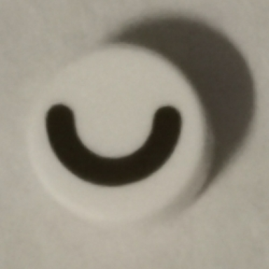 white tile round 1 x 1 with black eye closed thick curved line pattern