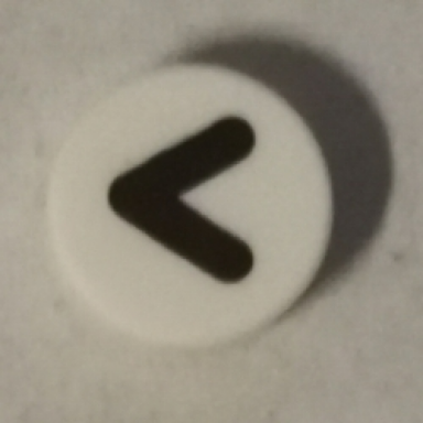 white tile round 1 x 1 with black eye shut tight letter v less than sign greater than sign thick line pattern