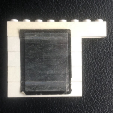 white stickered assembly 8 x 1 x 5 with mirror with black borders pattern sticker - set 265-1 - 4 brick 1 x 6 1 brick 1 x 8