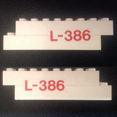 white stickered assembly 9 x 2 x 2 with red l-386 pattern on both sides stickers - sets 386 770 - 2 brick 2 x 8