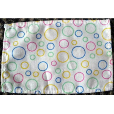 white duplo cloth curtain with multi-colored circles pattern