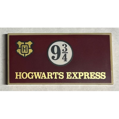 tan tile 2 x 4 with gold hogwarts express and crest black 9 3 4 in circle on dark red background pattern