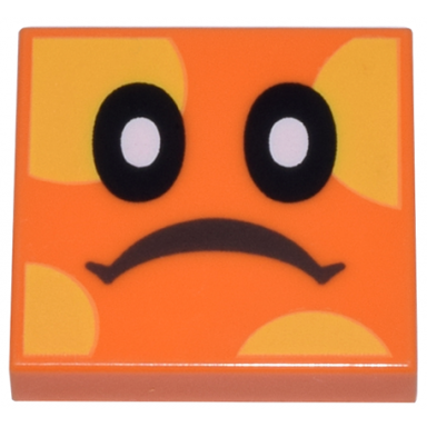 orange tile 2 x 2 with black eyes with white pupils frown yellow spots pattern super mario bramball face