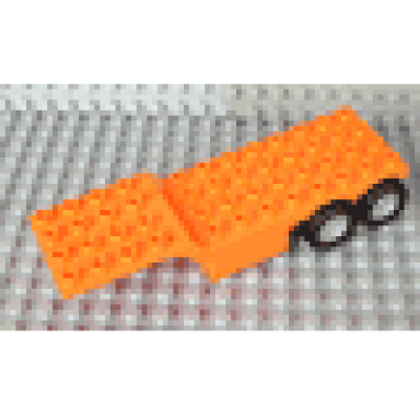 orange duplo trailer four rear wheels elevated front end 4 x 12