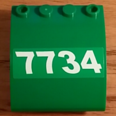 green slope curved 4 x 4 x 2 with 4 studs and pin holes with white slanting 7734 pattern model right side sticker - set 7734