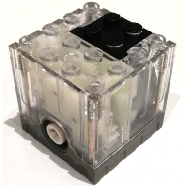 trans-clear electric motor 9v 4 x 4 x 3 1 3 with black conducting plate and dark gray base