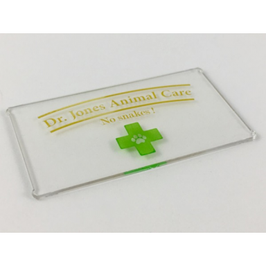 trans-clear glass for window 1 x 4 x 6 with gold dr jones animal care no snakes! and green cross with paw print pattern