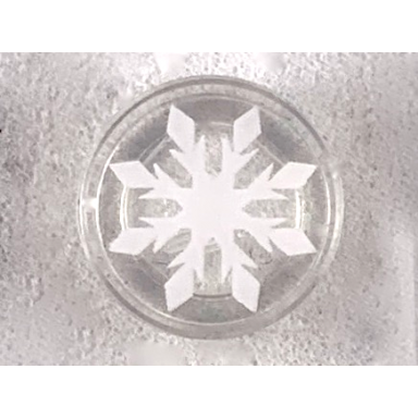 trans-clear tile round 1 x 1 with white snowflake with 8 points pattern
