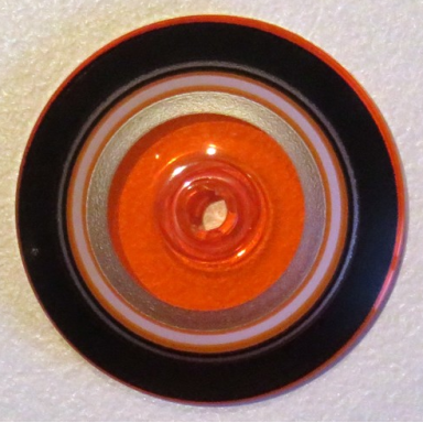 dish 4 x 4 inverted radar with open stud with black orange silver and white concentric circles pattern