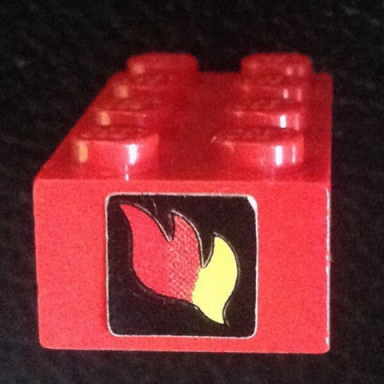 red brick 2 x 4 with classic fire logo pattern on one end sticker - set 374-1