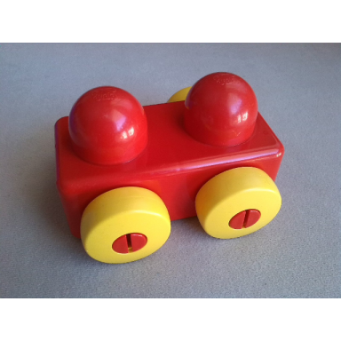 red primo vehicle wagon without tow hitches with yellow wheels
