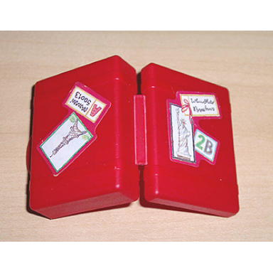 red scala utensil suitcase with eiffel tower and statue of liberty pattern stickers - set 3290