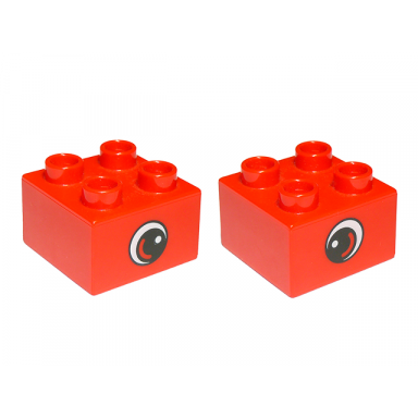red duplo brick 2 x 2 with eye small with white spot and curve pattern on opposite sides