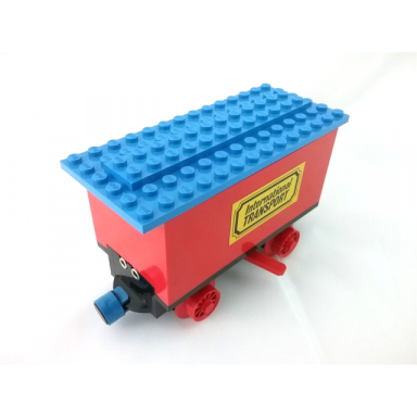 red train battery box car with two contact holes red switch lever blue and red magnets red wheels and blue roof with international transport pattern on both sides stickers - sets 161 181-1 183