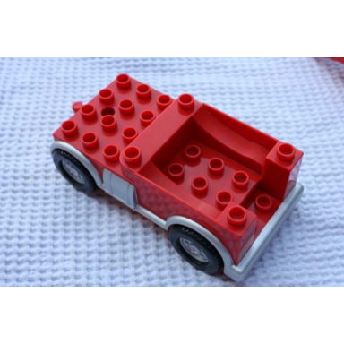 red duplo truck chassis with silver trim packer