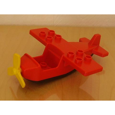 red duplo airplane small wings on top with black bottom and yellow propeller