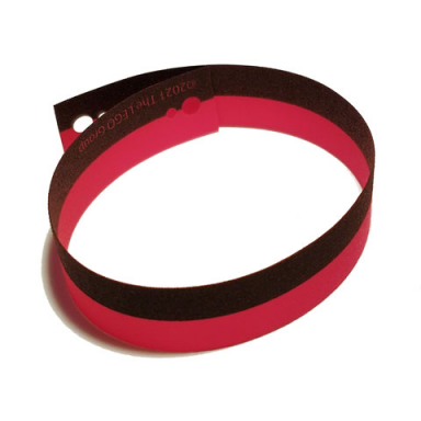red cloth typewriter ribbon with black ink pattern