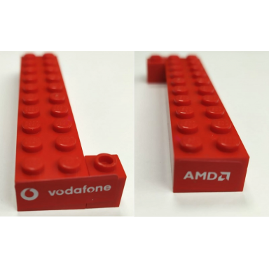 red stickered assembly 10 x 3 x 1 with amd and vodafone logo pattern stickers - set 8654 - 1 brick 2 x 10 1 technic brick 1 x 1 with hole