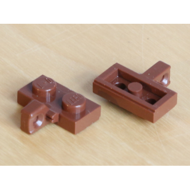 reddish brown hinge plate 1 x 2 locking with 1 finger on side with bottom groove