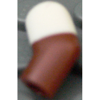 reddish brown arm left with molded white short sleeve pattern