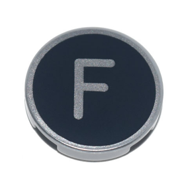 light bluish gray tile round 2 x 2 with bottom stud holder with silver capital letter f on black background pattern