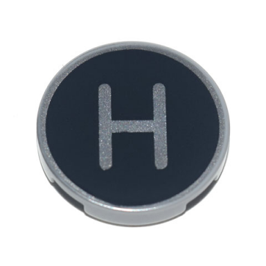 light bluish gray tile round 2 x 2 with bottom stud holder with silver capital letter h on black background pattern