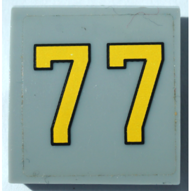 light bluish gray slope curved 2 x 2 x 2 3 with yellow number 77 pattern sticker - set 76037