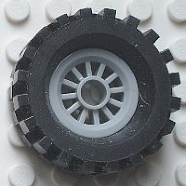 light bluish gray wheel spoked 2 x 2 with pin hole with black tire 30 x 10.5 offset tread 30155 2346